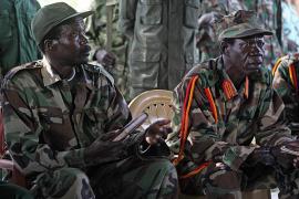 At the beginning of the Juba negotiations, Joseph Kony and his deputy Vincent Otti sit inside a tent at Ri-Kwamba in Southern Sudan. Photo credit: CSMonitor.